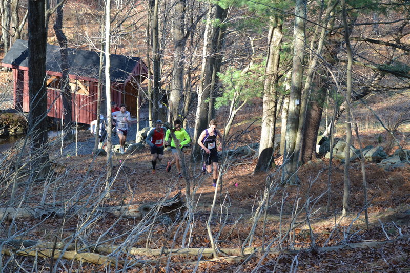 Runners heading uphill from the new Covered Bridge.