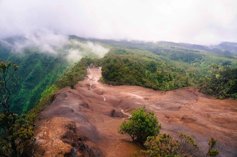 The mist rolls in above the Na Pali Coast, Kaua'i, Hawai'i.