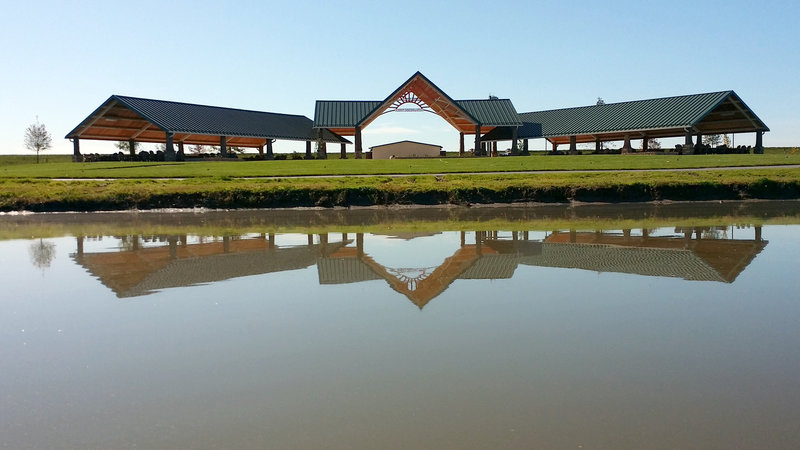 Pavilion at 370 Lakeside Park, view from the lake with the path in front.