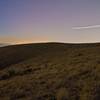 The Skyline Trail is even spectacular after the sun goes down, as subdivision glow illuminates the horizon, while a comet streaks past.