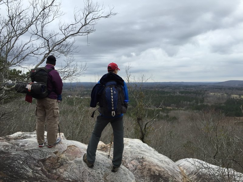 A couple hikers pausing to take in the view along the Pine Mountain Trail.