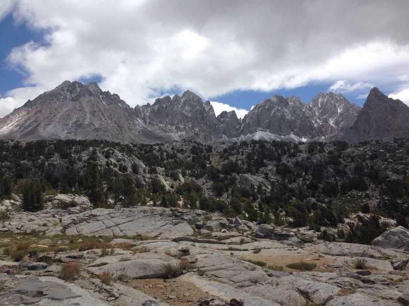 A view of the main block of the northern part of the Palisades, with (from left to right) Mount Agassiz, Mount Winchell, Thunderbolt Peak, North Palisade, and the triangular peak in the foreground is Isosceles Peak.