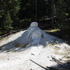 Extinct hot spring cone along trail.