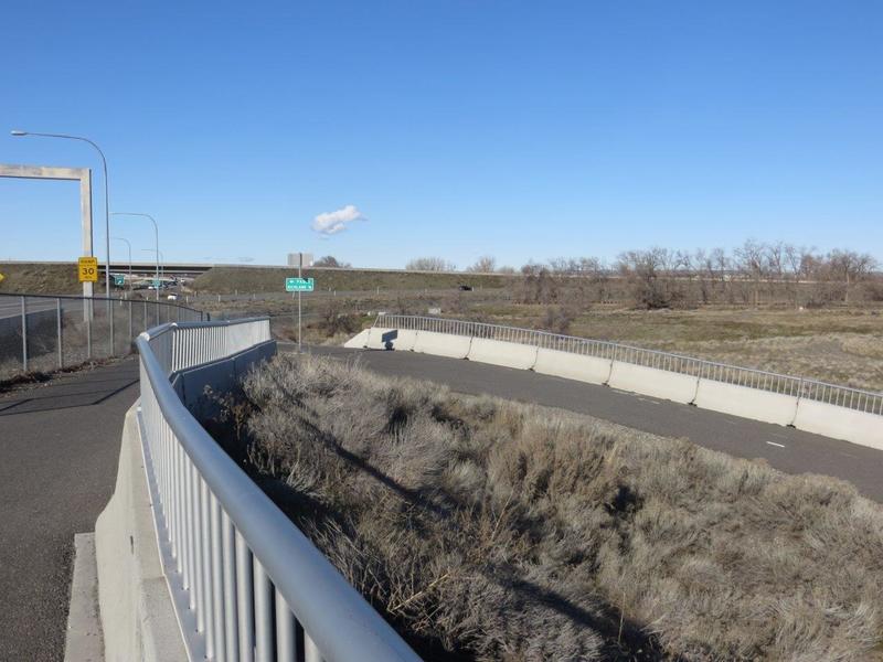 After crossing the Yakima River take the path to the right that drops down and under the bridge.