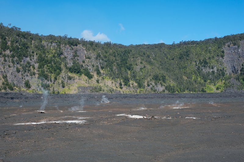 Steam venting up from the magma core through the crater floor.