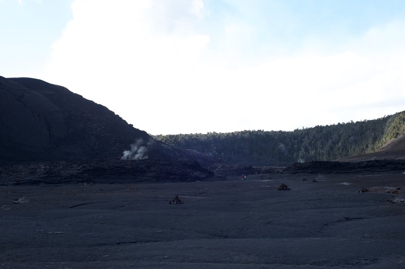 Ahu marking the trail and steam venting from the crater.