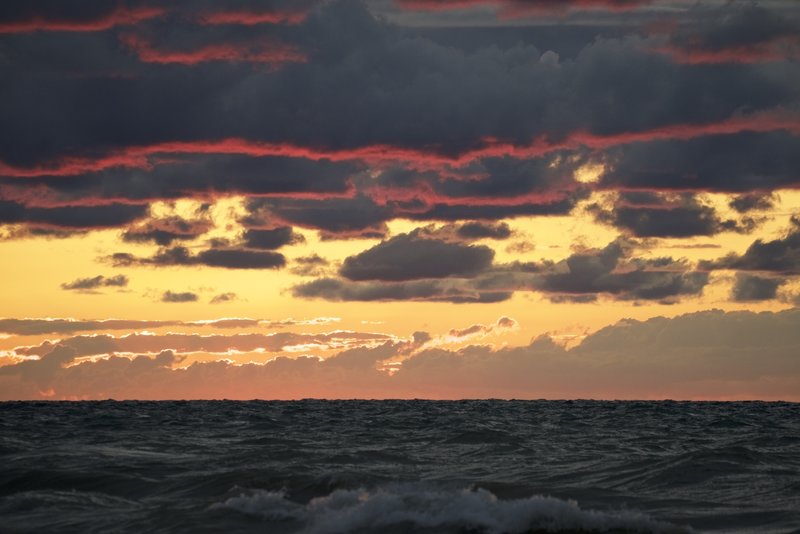 It's incredible what the sun will do at sunset on Lake Michigan. This painting of the underside of the clouds happens a couple times a year.