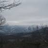 There are clearings along the trail that open up and the crest of the Smokies are visible on clear days. Here, snow covers the crest.