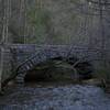 The Laurel Creek Road passes close by the trail as you approach the Schoolhouse Gap parking lot.  This arch bridge crosses Laurel Creek and provides access from Townsend to Cades Cove.