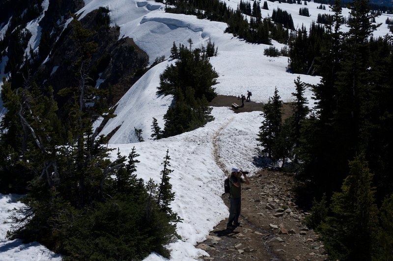 Snow can cover the trail into July. Be ready to hike in snow and check conditions before heading out.