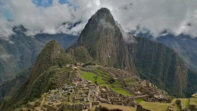 Money shot!  The ruins photographed from a common viewing point.  The taller peak in the background is Wayna Picchu (or Huayna Picchu), and it is possible to climb to the top for a different view of the ruins.  You need a special permit to do this - check it out before you go.