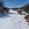 A ribbon of snow beckons you onward.