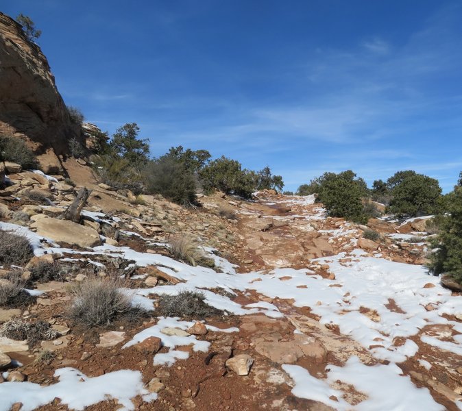 The road is a mixture of sand and sandstone.