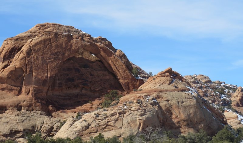 Moab Rim Arch is in the foreground but can you spot tiny Tukunikivatz Arch on the horizon?