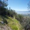 The trail gets narrow at this point and becomes less maintained.