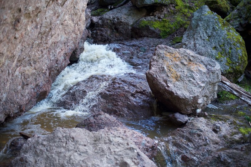 Water working its way around the rock.