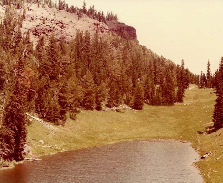 The trail passes Canoe Lake and continues northeast a 1/4 mile to the park boundary.