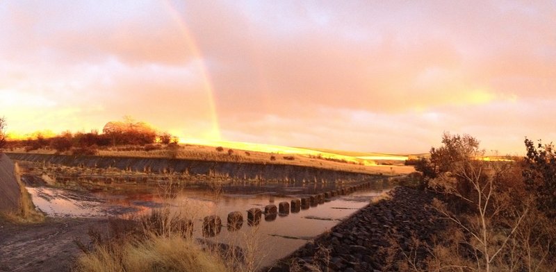 Part of the trail crosses over this concrete spillway.