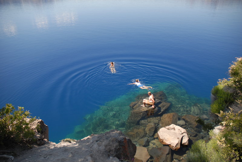 Swimmers enjoy the beautiful clear water of Cleetwood Cove.