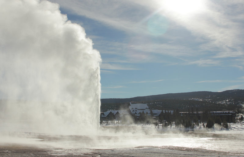 Beehive Geyser, a classic cone-type geyser, erupts a steady column of water through a small vent or geyserite cone. Beehive's cone acts like a nozzle shooting water 200 feet high. Photo courtesy of the National Park Service.