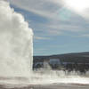 Beehive Geyser, a classic cone-type geyser, erupts a steady column of water through a small vent or geyserite cone. Beehive's cone acts like a nozzle shooting water 200 feet high. Photo courtesy of the National Park Service.