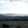 The trail as it descends towards Alpine Road and Interstate 280. Clouds roll along the hills, making for a great view.