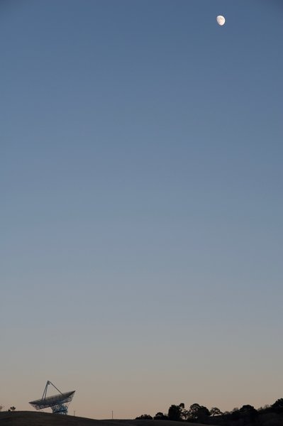 The Stanford Dish and moon at sunset.