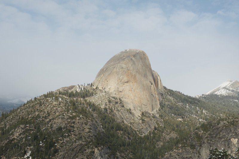 Half Dome looks very different from this viewpoint at Panorama Cliff.