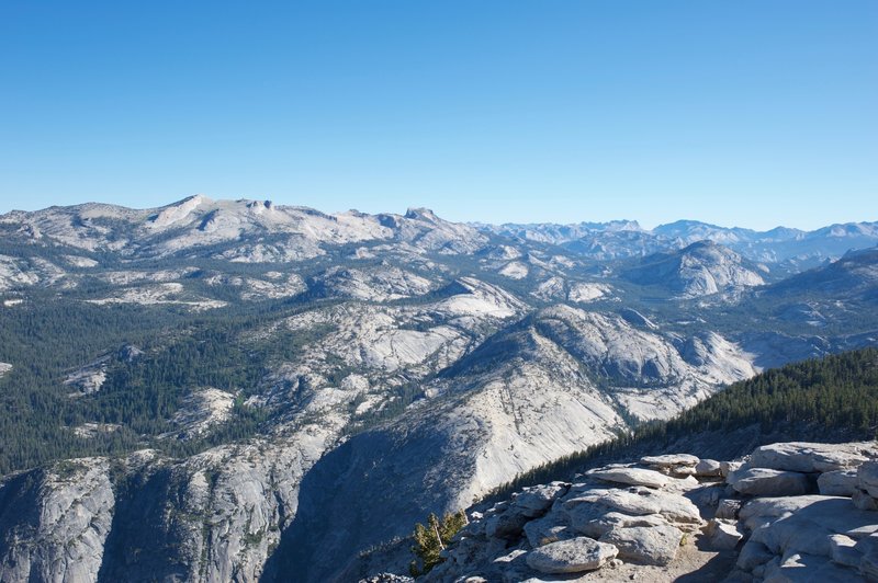 The granite domes of the high country.  You can see Tenaya Lake in the distance.