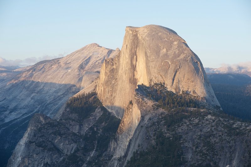 Half Dome at sunset.  The view from Glaciers Point at sunset is popular, especially in the summer. Make sure you get there early to find a spot.
