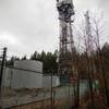 The cell tower at the top of the hill.