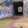 Graffiti on the railroad tunnel, northeast side.