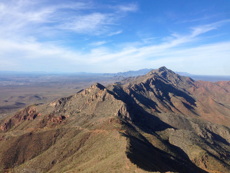 The view north from North Franklin Ridgeline. Beyond the Franklin Mountains in the foreground are the Organs, just east of Las Cruces. The Robledo range is visible in the distance. Views from here can reach for over a hundred miles.