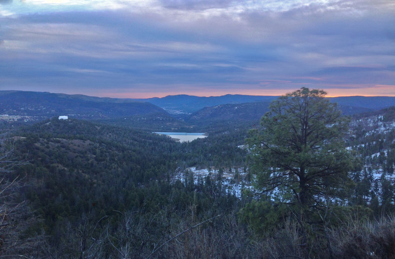 Grindstone Lake and the Ruidoso Valley just before dawn. Alfred Hale Connector is the perfect spot to watch the sun rise over the mountains.