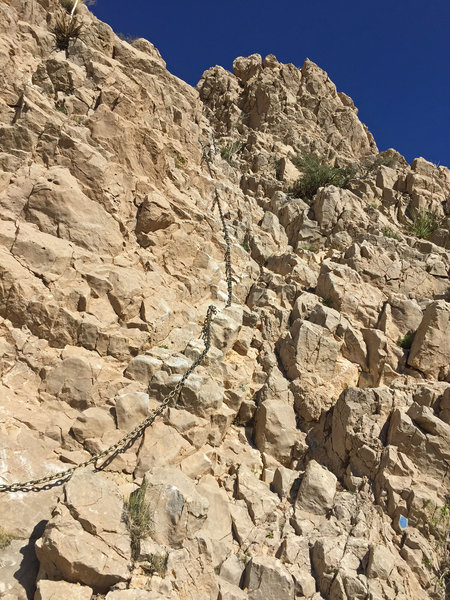 About as tough as it gets along a trail, the climbing segments on Ron Coleman are fairly easy by bouldering standards, maybe a v1. There are plenty of good holds and a chain to help out.