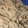 About as tough as it gets along a trail, the climbing segments on Ron Coleman are fairly easy by bouldering standards, maybe a v1. There are plenty of good holds and a chain to help out.