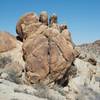 Large boulders sit alongside of the trail. Feel free to explore, but make sure to be on the lookout for snakes, scorpions, and other animals that rest in the shade.