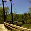 One of two suspension bridges across the Neuse River on MST Segment 11B. Photo by PJ Wetzel, www.pjwetzel.com.