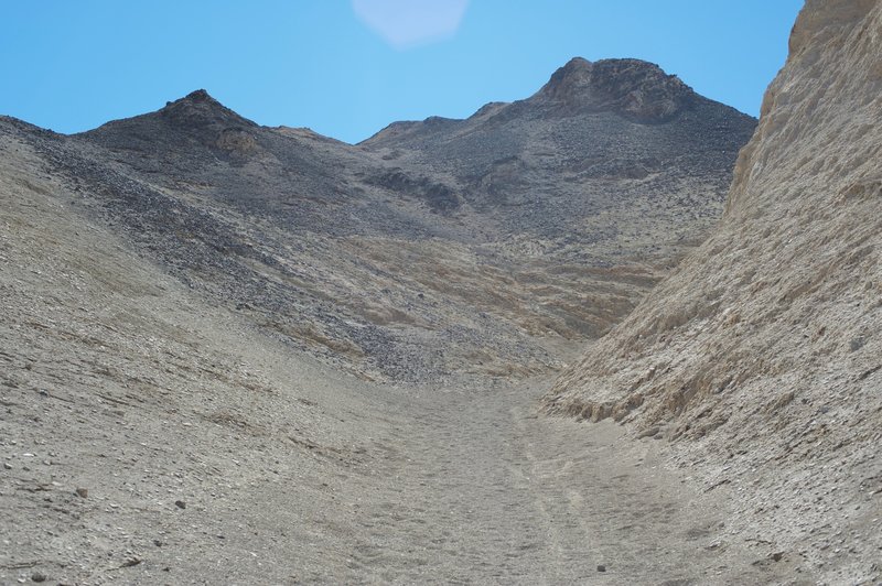 The end of the trail climbs steeply out of the canyon to the ridge line above. The views make it worth it though. Made up of loose sand and gravel, its makes for easy ascension.