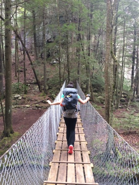 Crossing the bridge to the base of Foster Falls along the Fiery Gizzard Trail.