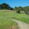 The trail as it winds up into the preserve.  In the spring, the grasslands are at the bottom of the trail.