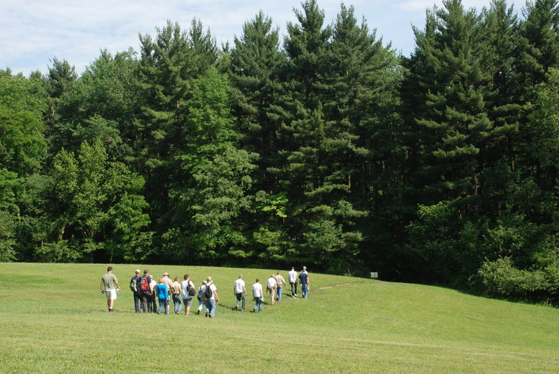 You'll walk across this field/hill to reach the start of the trail. Photo: NPS DJ Reiser