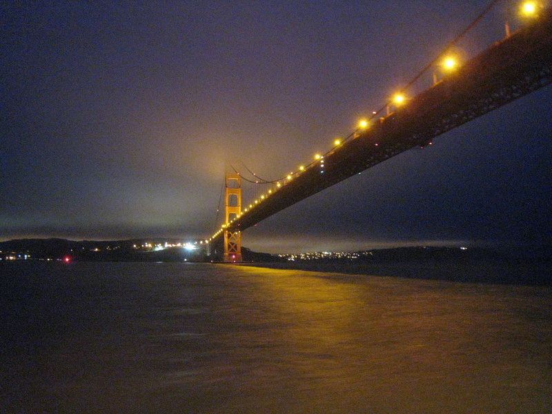 Golden Gate Bridge lights up at night.