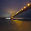 Golden Gate Bridge lights up at night.