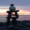 Inukshuk at sunset close to the William F. Schwartz Memorial Point along the Gaff Point Trail.