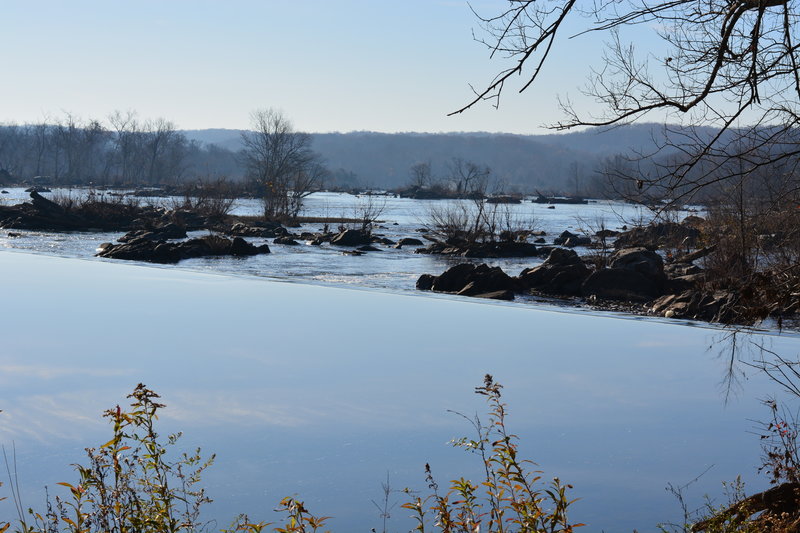 View across the aqueduct dam from Riverbend Park towards the falls.