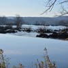 View across the aqueduct dam from Riverbend Park towards the falls.