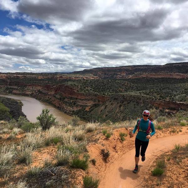 Beautiful desert running over the Colorado River on Horsethief Bench. Photo: Michelle Smith. Runner: Jordan Fields