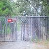 The trail dead ends at private property on the park boundary.