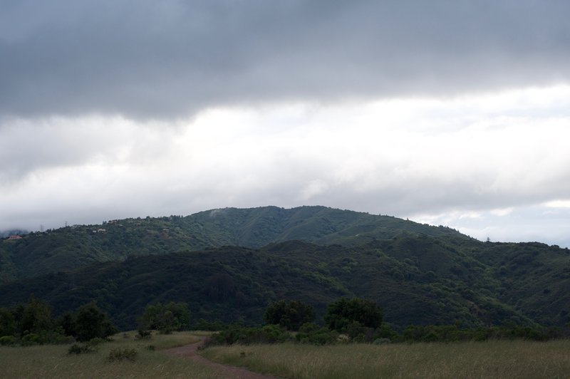 The trail as it makes its way along the hilltop and the surrounding hills.